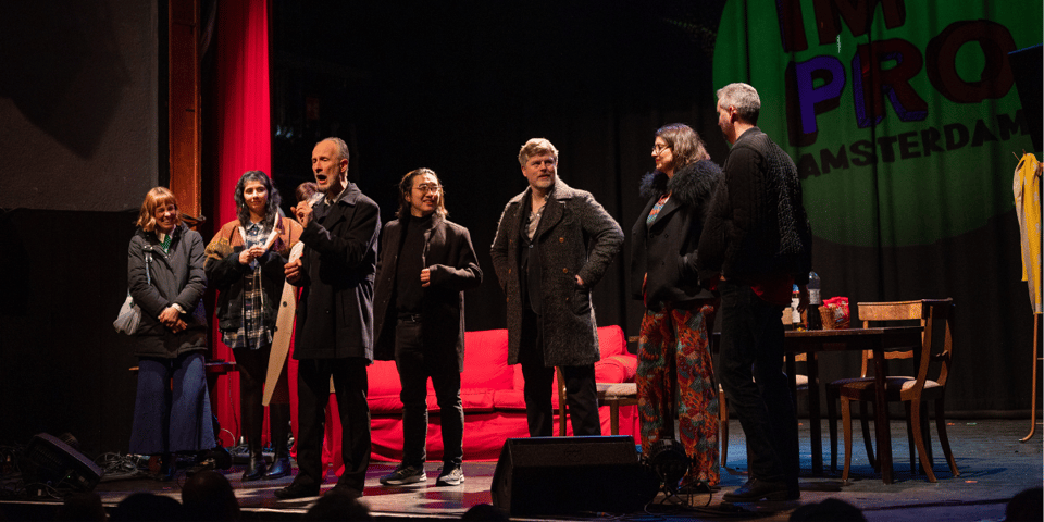 The cast of Reunion in their coats.