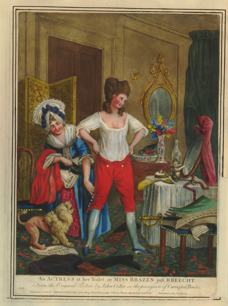 A woman getting dressed in men's trousers with the help of a woman wearing a large bonnet, while a weird-looking dog looks on excitedly. The caption reads "An ACTRESS at her Toilet, or MISS BRAZEN just BREECHT"