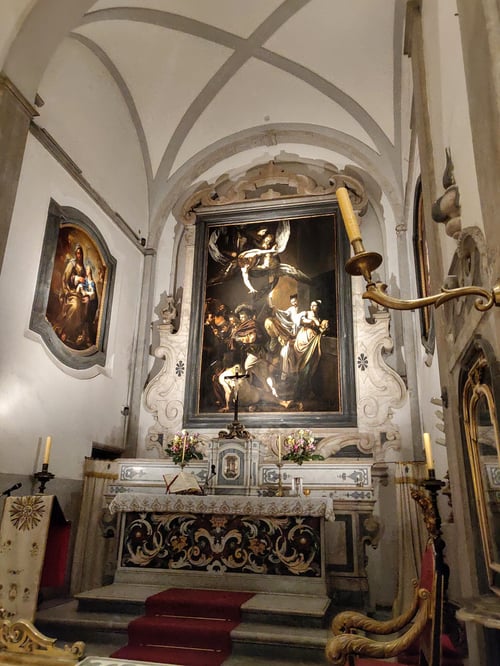 Interior of the church "Pio Monte della Misericordia" in Naples, Italy, with Caravaggio's painting "Sette opere di misericordia".