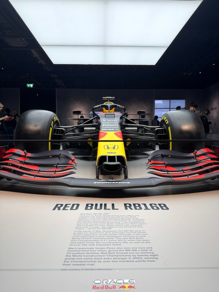 Low-angle nose-on photo of the Red Bull RB16B racing car.