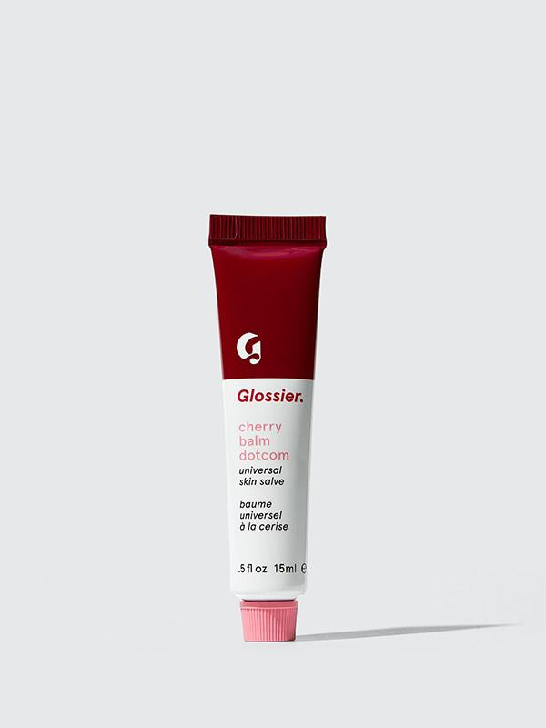 A tube of Glossier balm.com in cherry