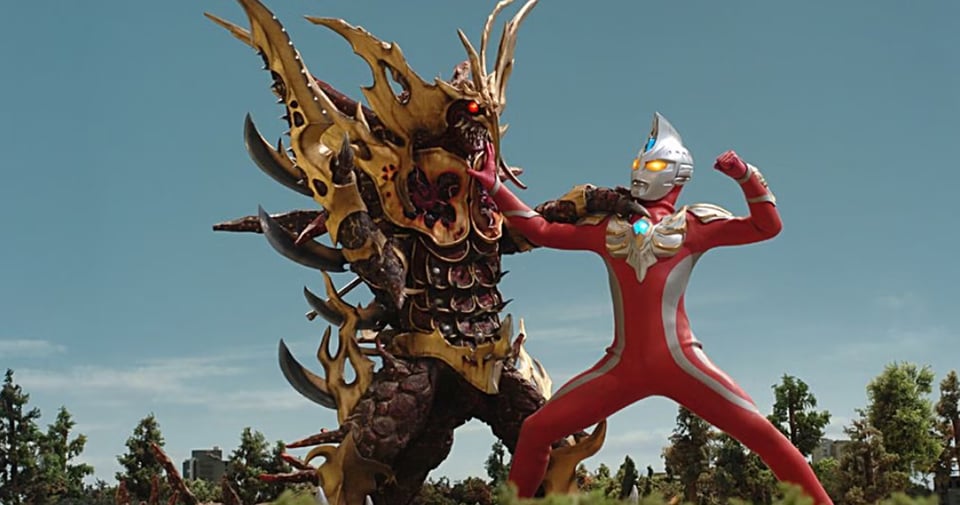 Ultraman fighting a monster.