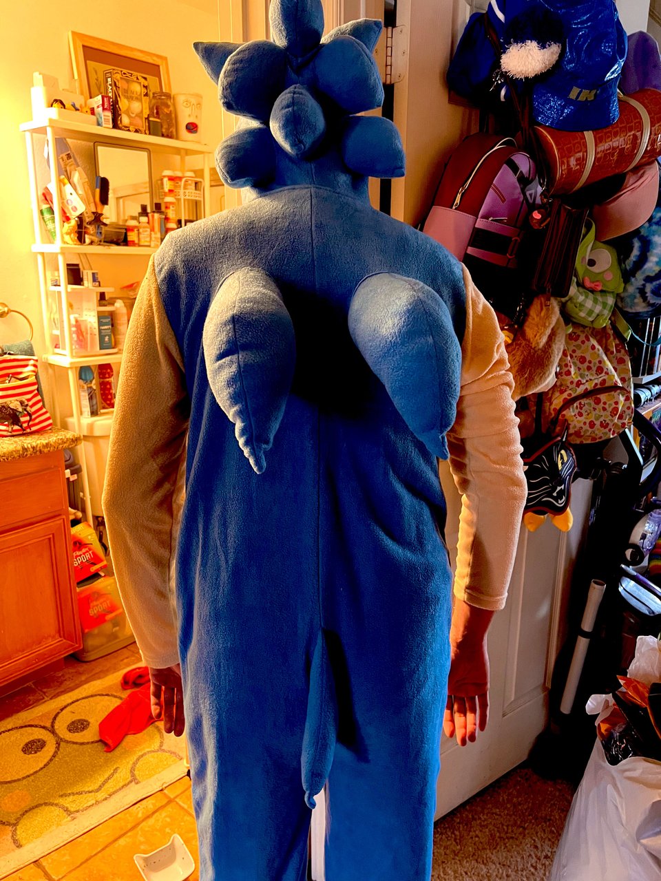 David showing off the back of the union suit in an ominous fashion.