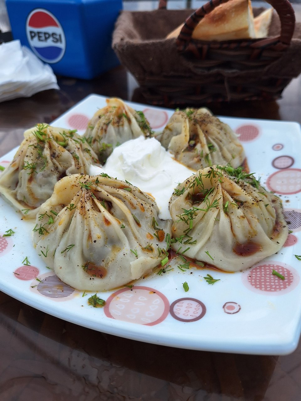 Manti dumplings with cream