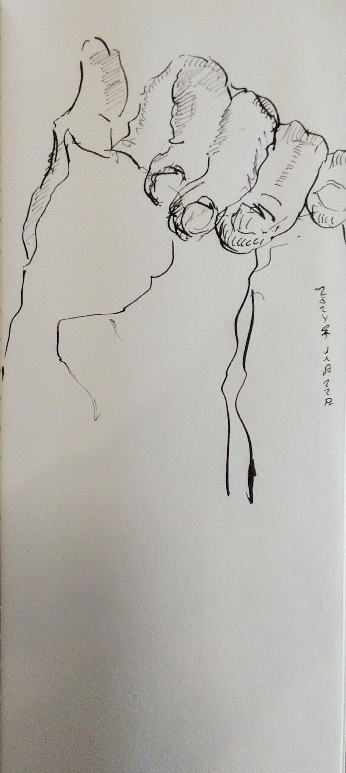 Wobbly hand gripping a bag of tea, strictly for pedagogical purposes