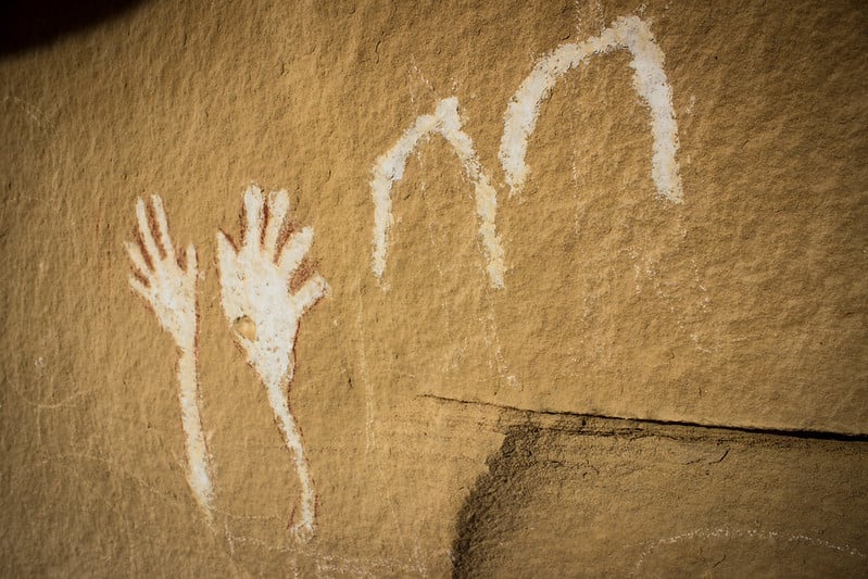 petrogylph of waving hands