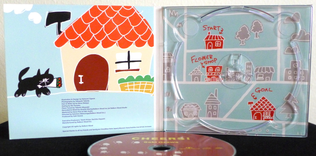Inside case of CD “/Cheers!/” by Saki Ozawa