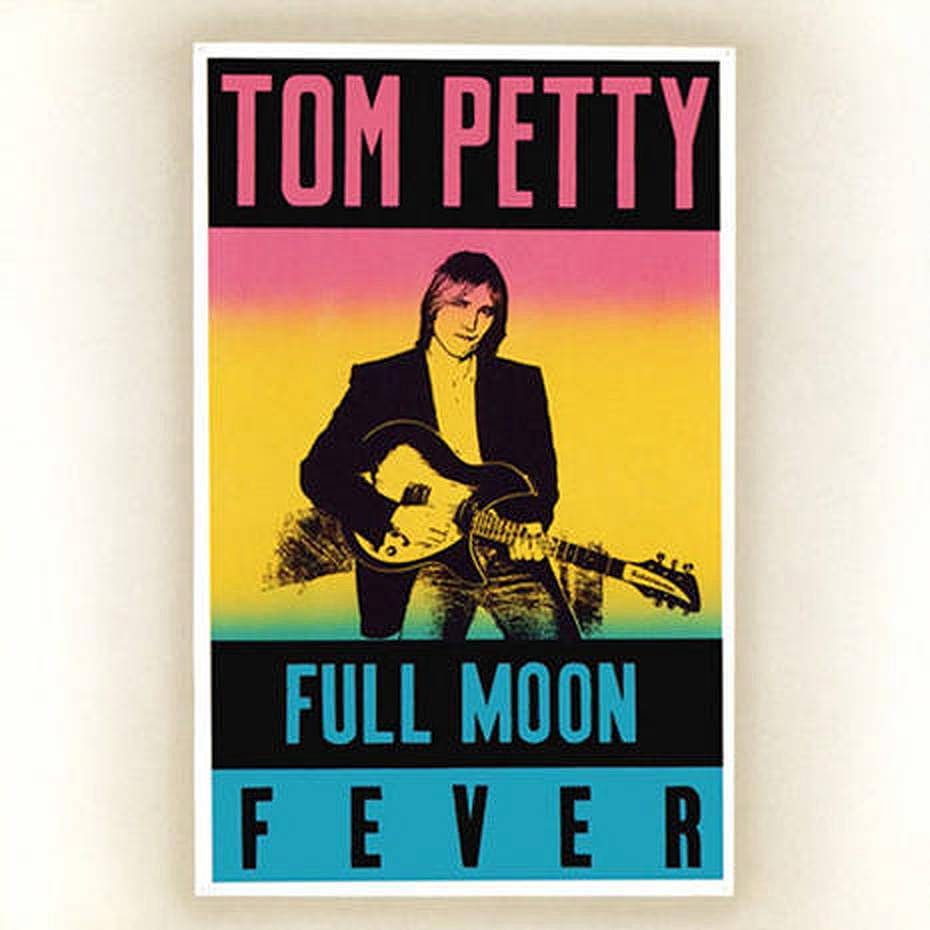 A photo of Tom Petty, a skinny white guy with a long narrow face, playing a guitar. He has an odd look on his face; he may be biting his lip? The photo is tinted rainbow style, going from red at the top to yellow (which covers most of Petty's body), to blue at the bottom.