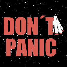 A picture which says 'Don't Panic', with a towel hanging off it - an homage to Douglas Adams' 'Hitchhiker' series.