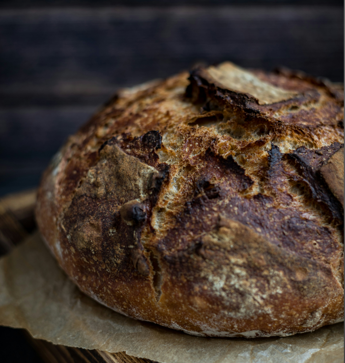 A loaf of bread, round and with a perfect crust.