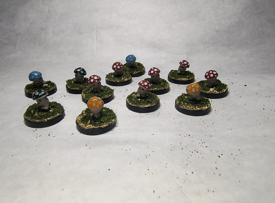 Picture of a collection of little mushroom guys.