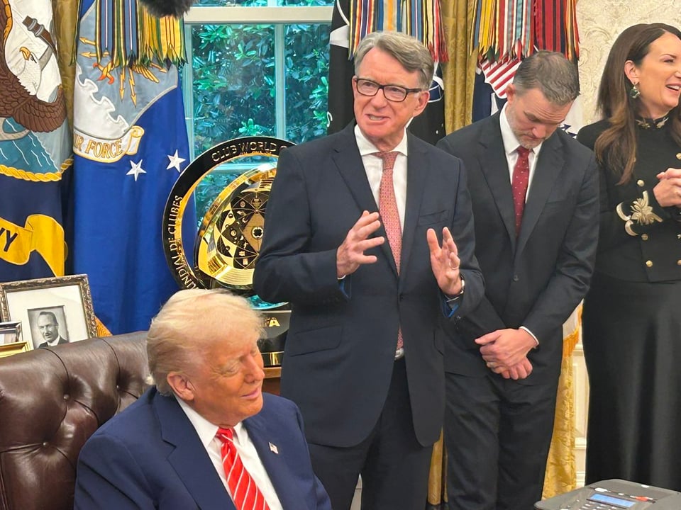 Mandelson, arrested yesterday, standing to the side of Trump.