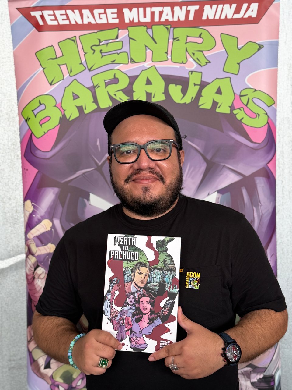 37-year-old Henry Barajas showing his new graphic novel Death to Pachuco at Cape & Cowl Con. Photo by Crystal Caliber.