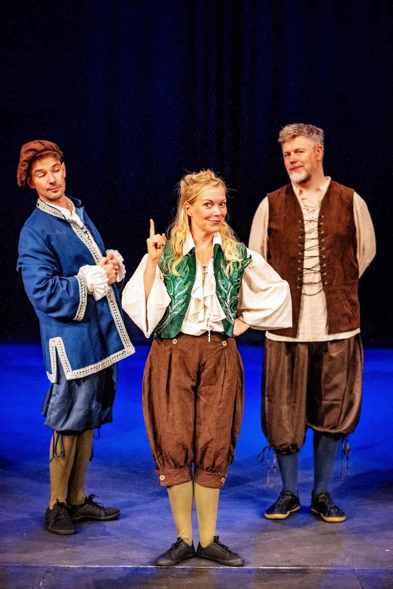 Three improvisers dressed in Elizabethan garb.