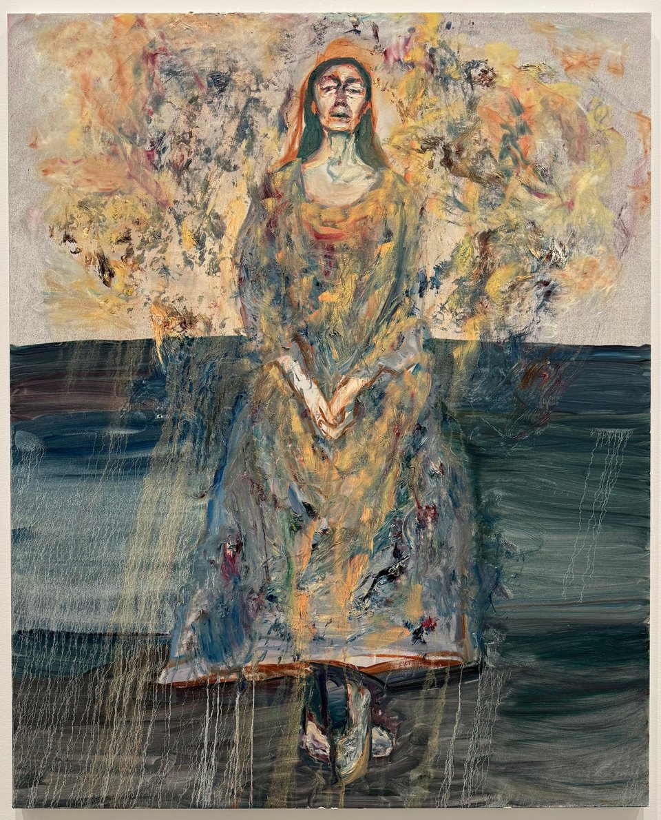 Photo of self-portrait of Celia Paul, with a lot of tempest and color around her