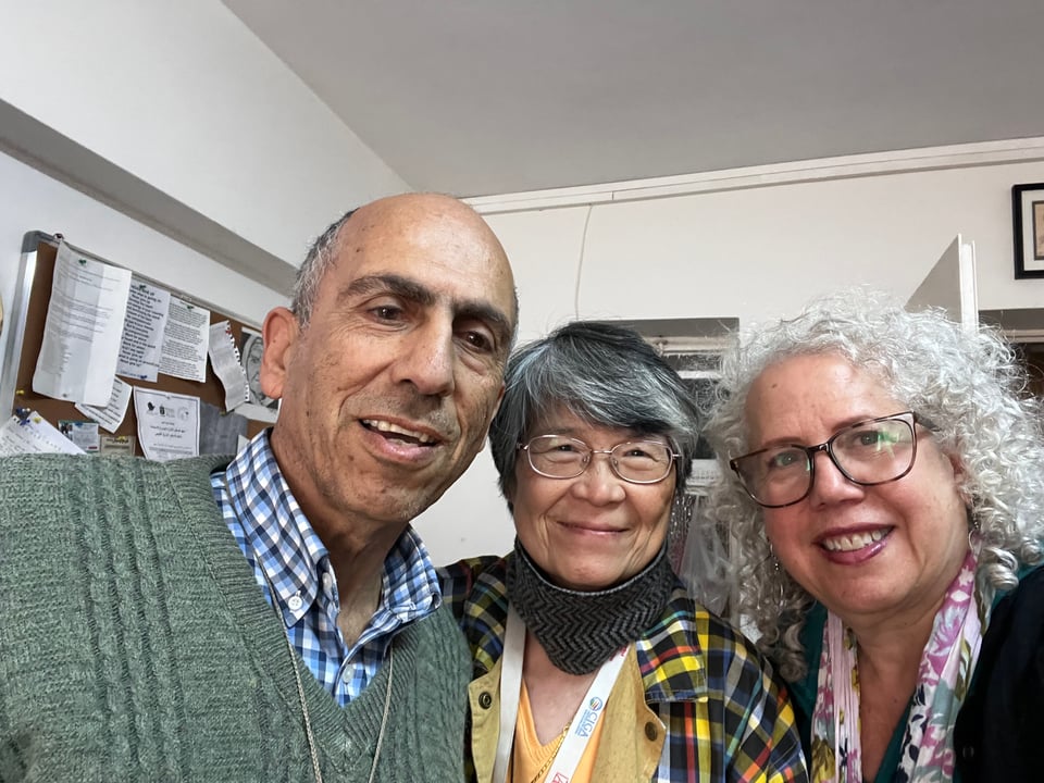 Three people posing for a selfie