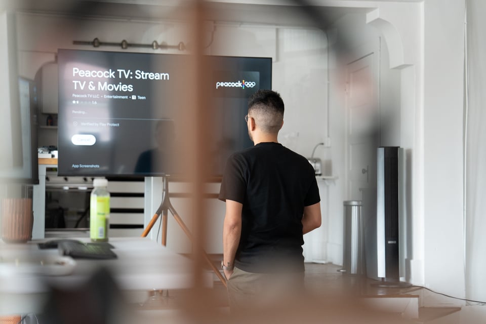 Justin setting up a TV.