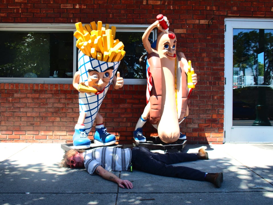 Lenny collapsed on the street in front of First Prize Mike's