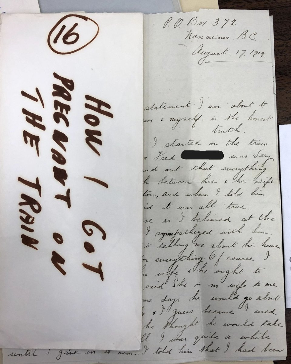 photo of a handwritten letter. An envelope with large printing has the number 16 written on it and "How I got pregnant on the train." The envelope obscures much of the letter which is behind it,
