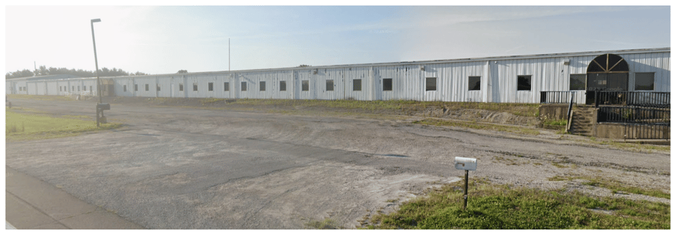 A Google street view of Midwest Micro's former address. Today there is a long, single-floor building, in the middle of a field.