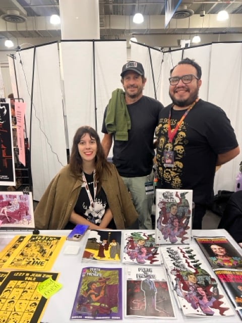 a group of people at a comic convention