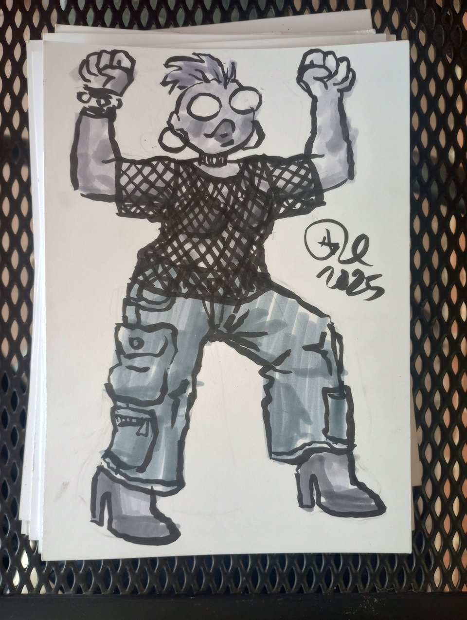 Val in a mesh shirt, bra, heels, and big ass cargo pants