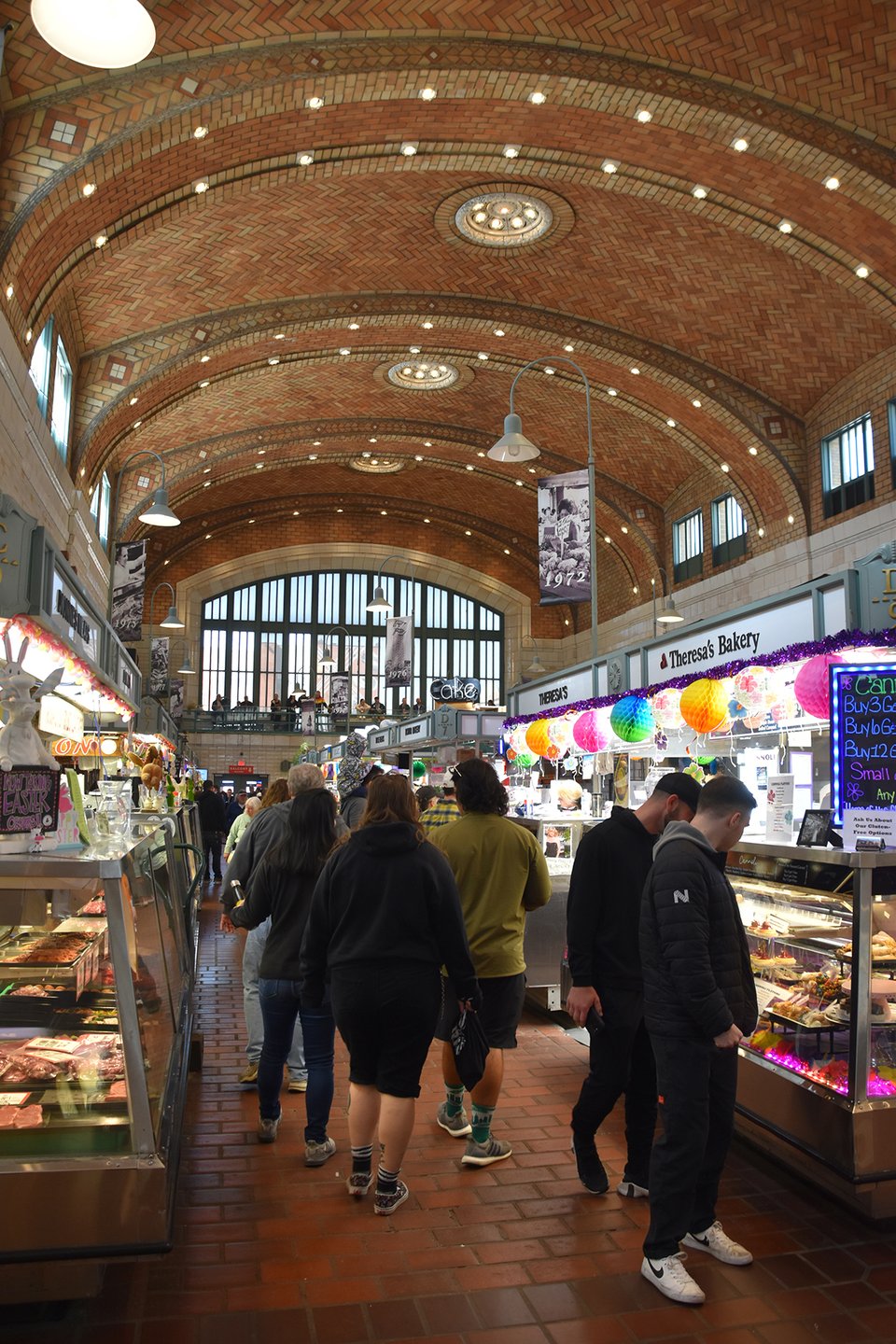 People shopping in an indoor market.