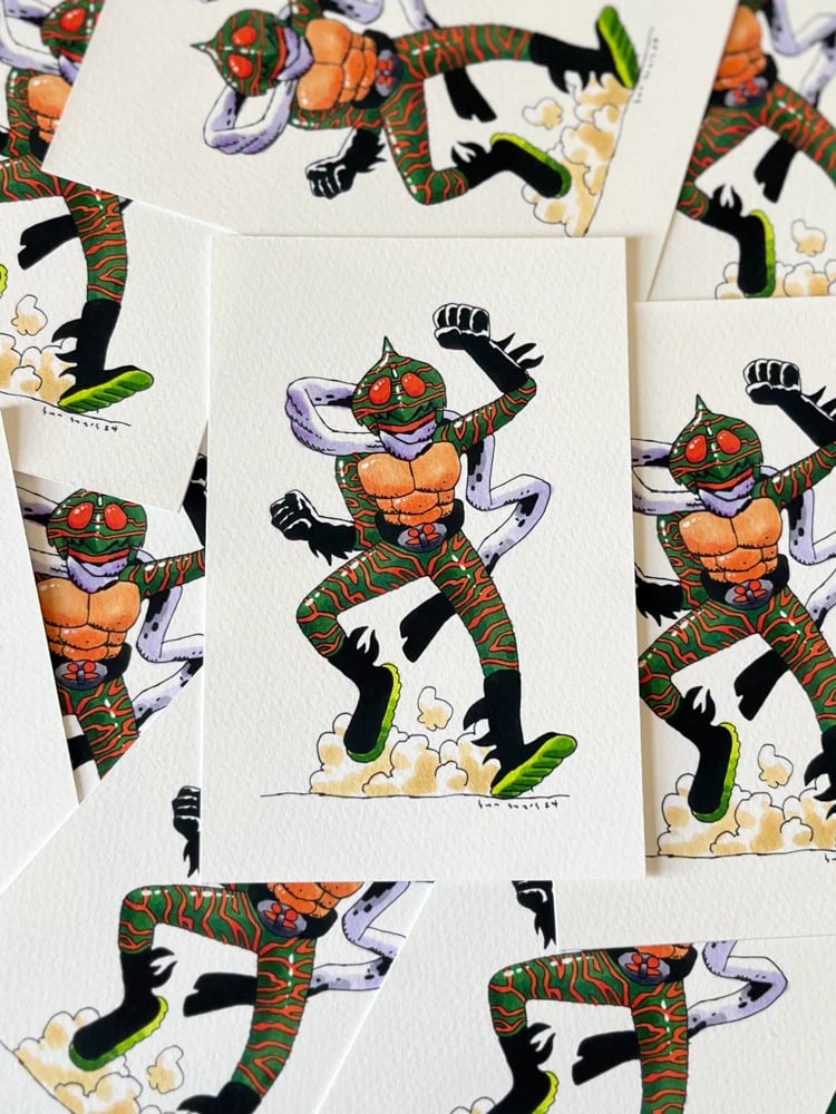 a picture of some prints depicting Kamen Rider