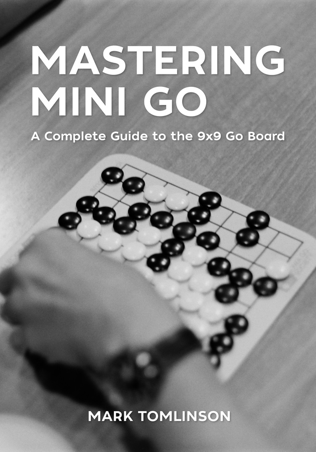 Cover image of Mastering Mini Go: a 9x9 go board with a hand placing a stone