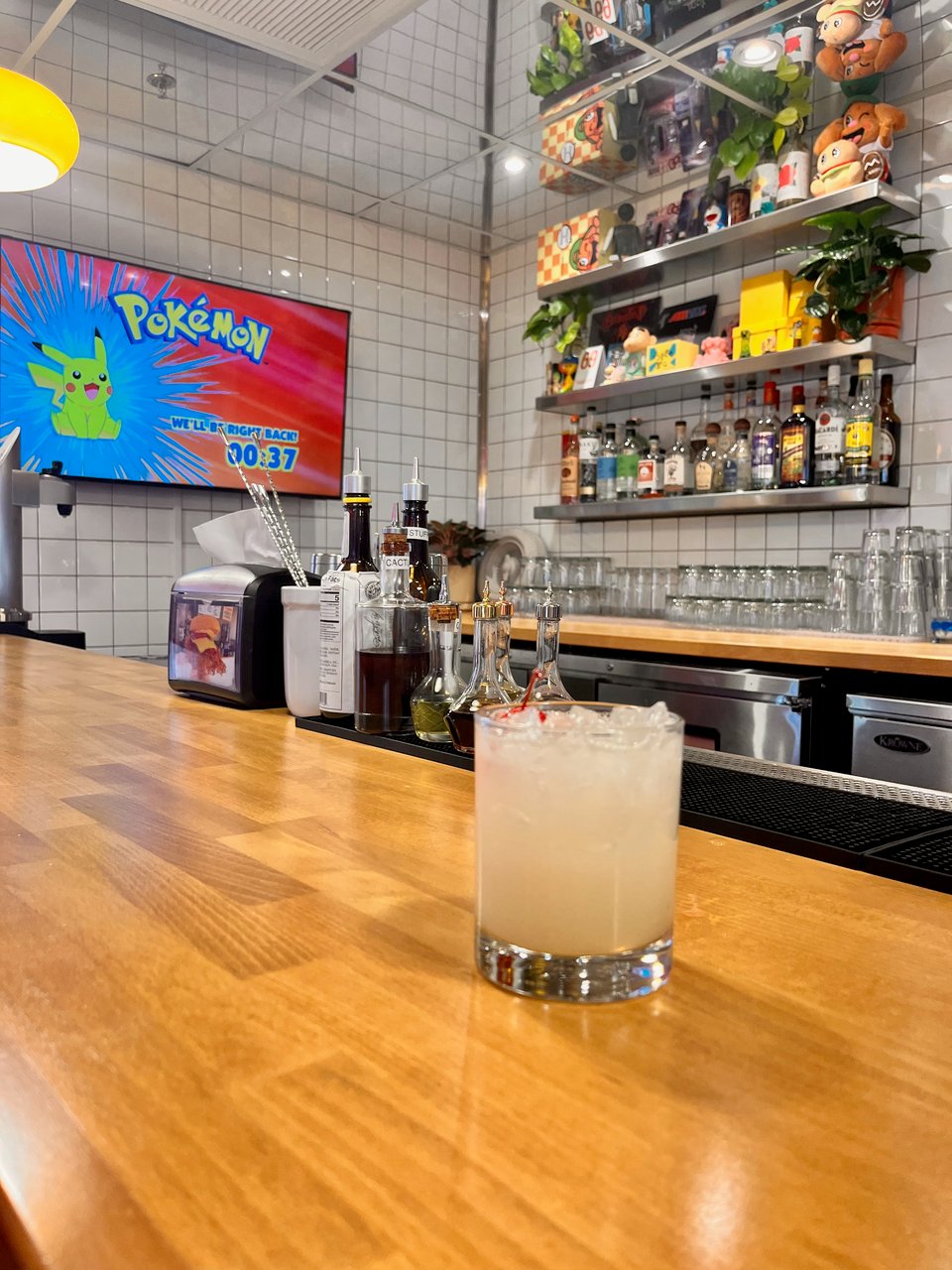 a glass of lemonade sits on the bar at bad jimmy's in tempe az