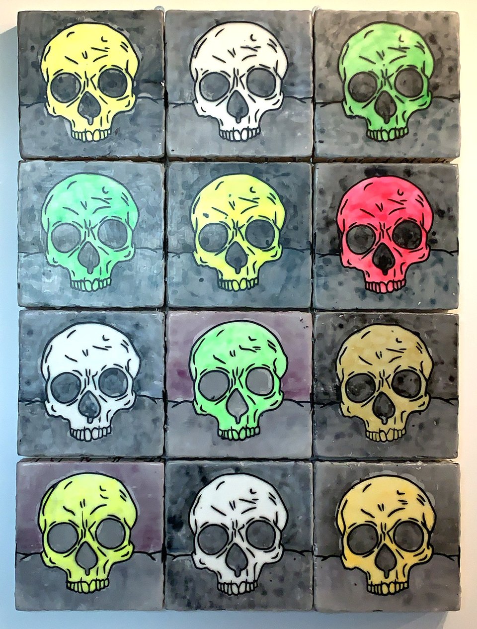 12 glow in the dark skulls in different colors
