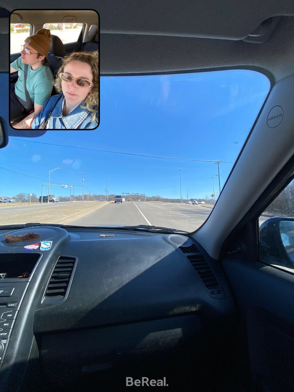 two people in a car