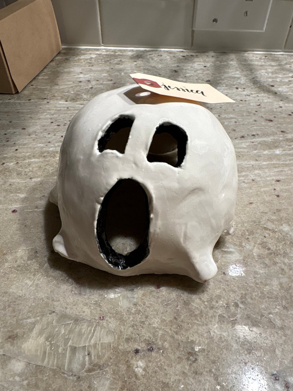 Spooky amoeba-shaped ceramic ghost, hand-crafted by Jess!