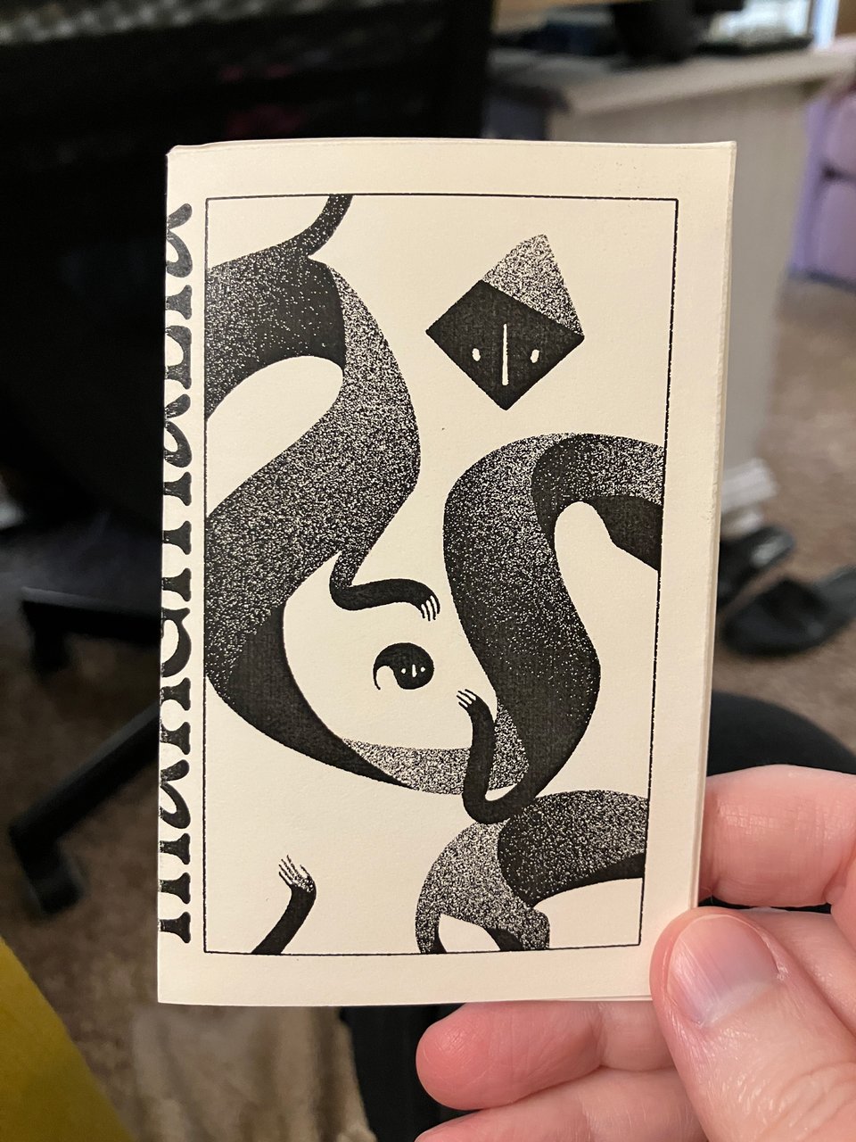 A picture of the first issue of Marginalia, featuring a ribbon-like Kīrolisk