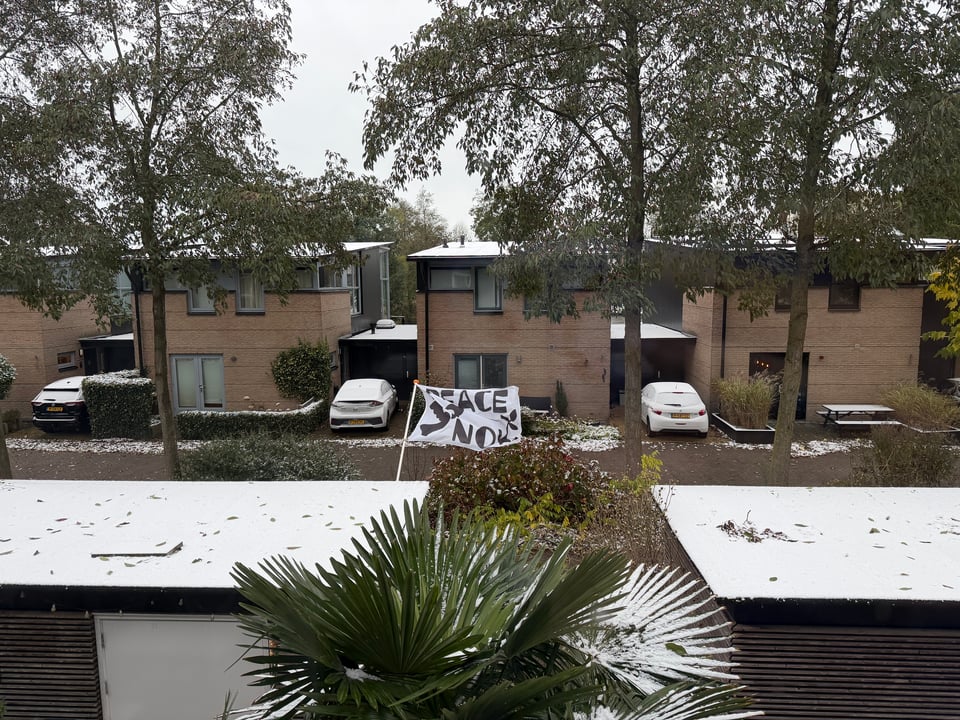 A light dusting of snow covers the rooftops