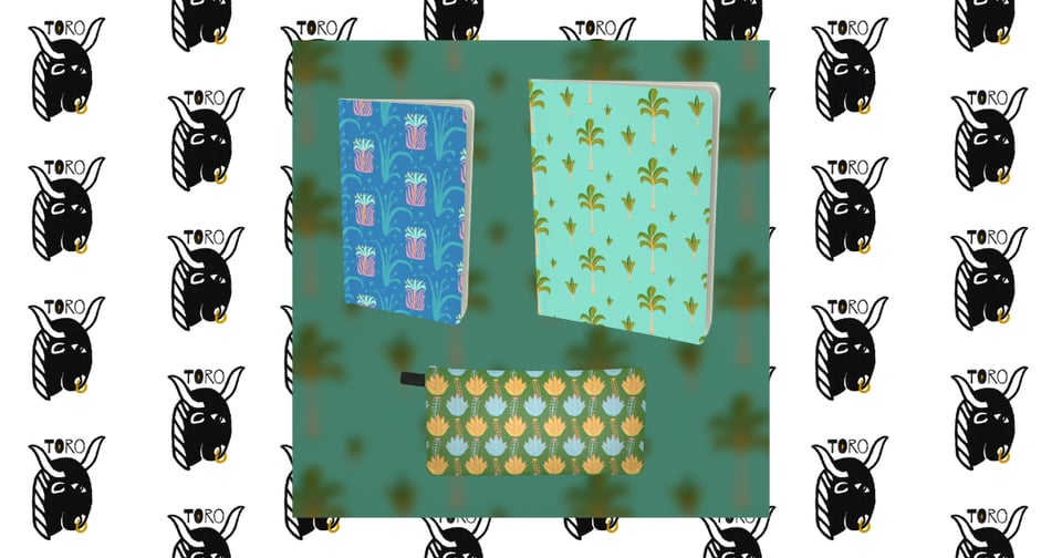 A small blue notebook with a repeating blue, green, and pink flor de coquĂ illustration, a large turquoise notebook with a repeating green, orange, and beige Royal Palm illustration, and a green pencil case with a blue, yellow, and pink agave illustration, on a blurred background. Image is set atop a repeating pattern of the TORO logo.