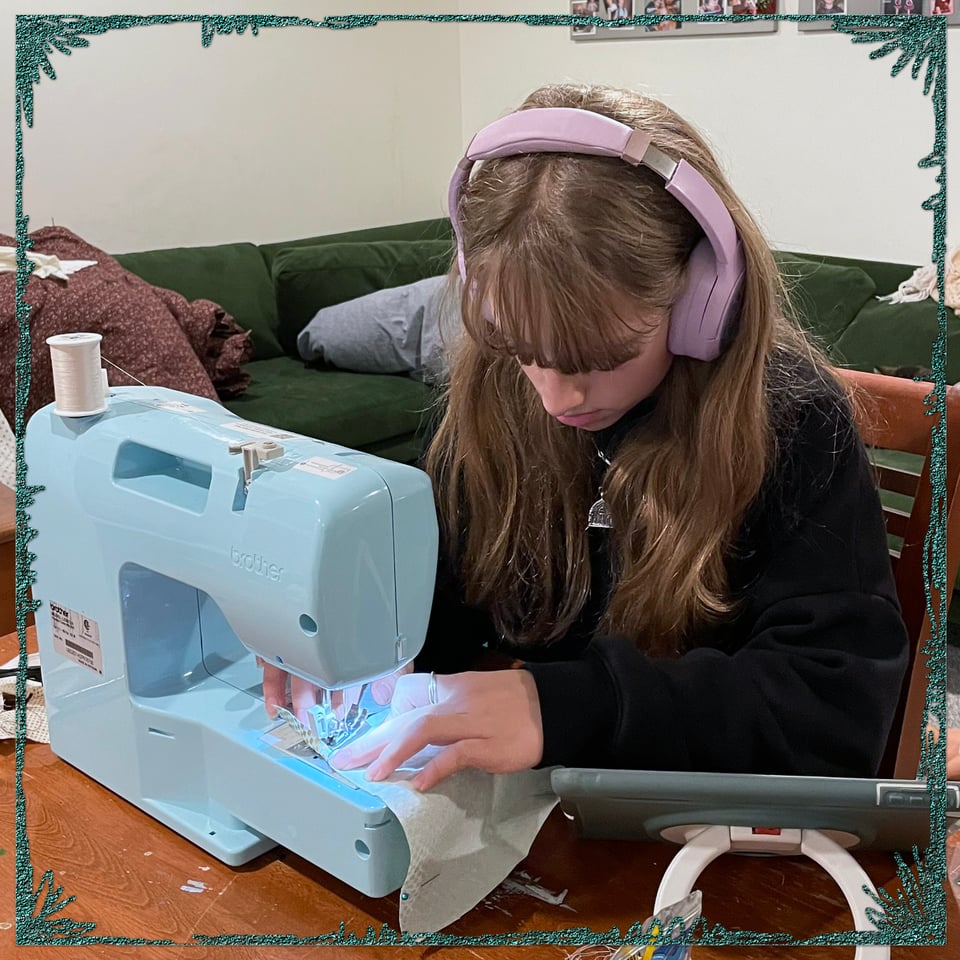 teen at the sewing machine