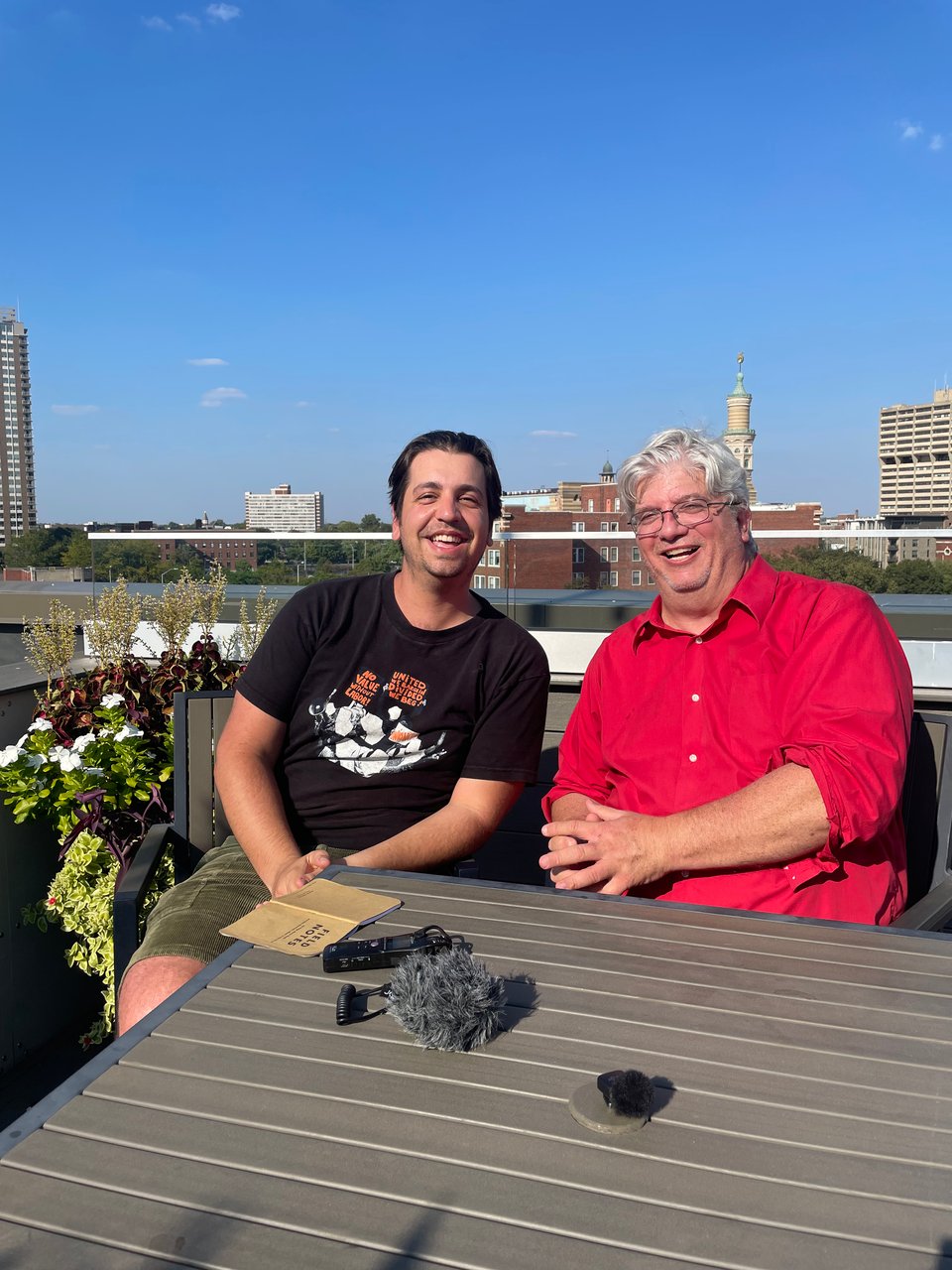 A photo of Michael Zarick and Lou Harry on the roof of Industrious