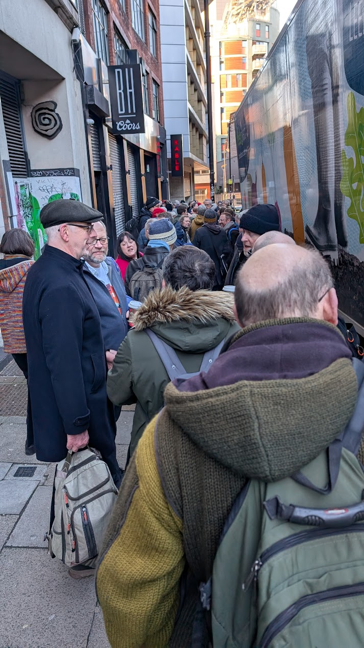 a long queue of grognards in the fair but frosty city of Manchester