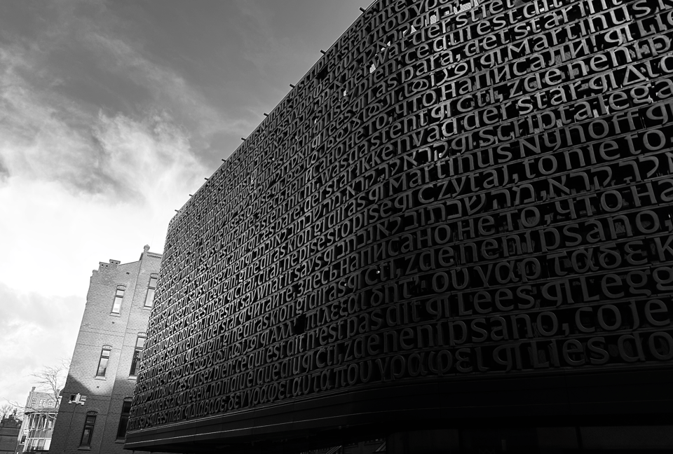 Moody black and white photo of the lettering. Is this the color the lettering will settle on when the bronze has achieved its patina?