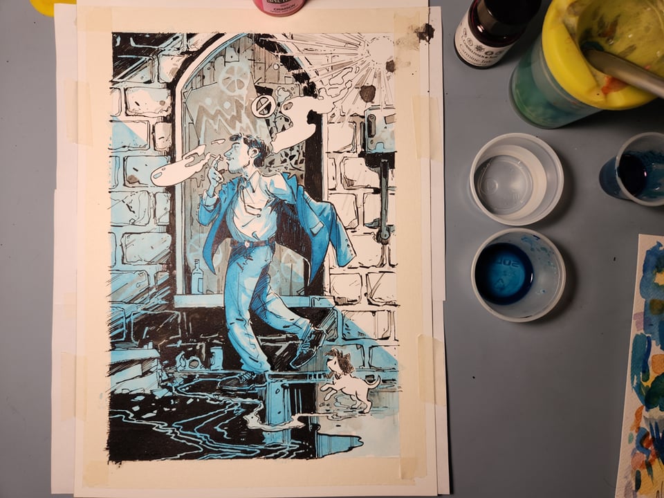 A photo of in-progress colours for the film poster.