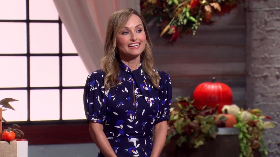 a woman in a floral dress