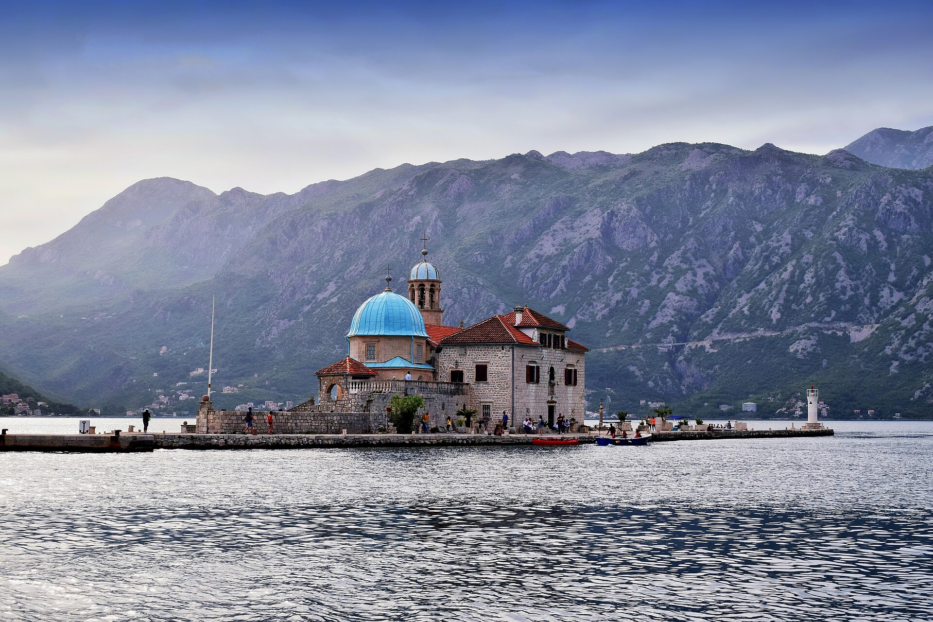 The church of Our Lady of the Rocks, with its blue dome, rising out of the Bay of Kotor on its man-made islet