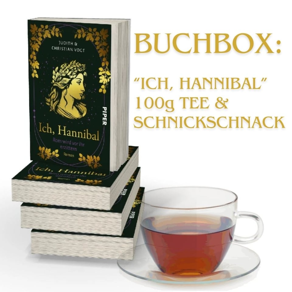 Eine Vorschaugrafik auf die Buchbox: Eine Tasse Tee vor einem (Mock-up-)Buchstapel. Daneben steht "Buchbox: Ich, Hannibal, 100g Tee & Schnickschnack"