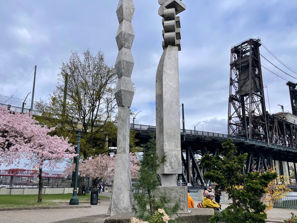two metallic sculptures comprising Friendship Circle in the park