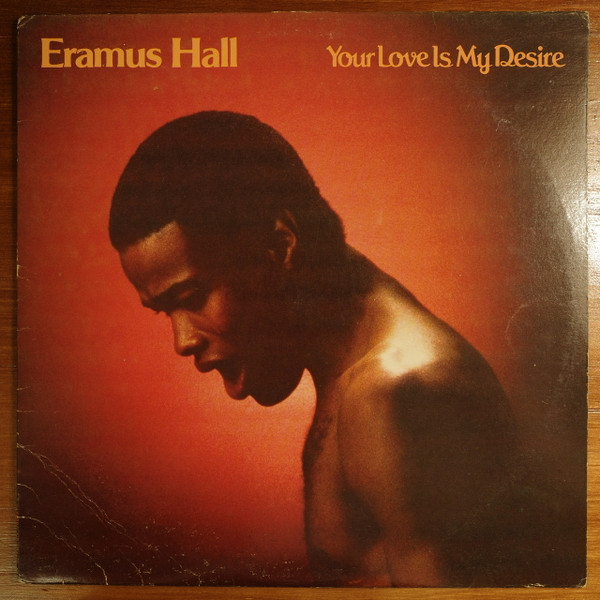 The cover of Eramus Hall's Your Love Is My Desire, showing a shirtless Black man looking downward against a burnt orange background