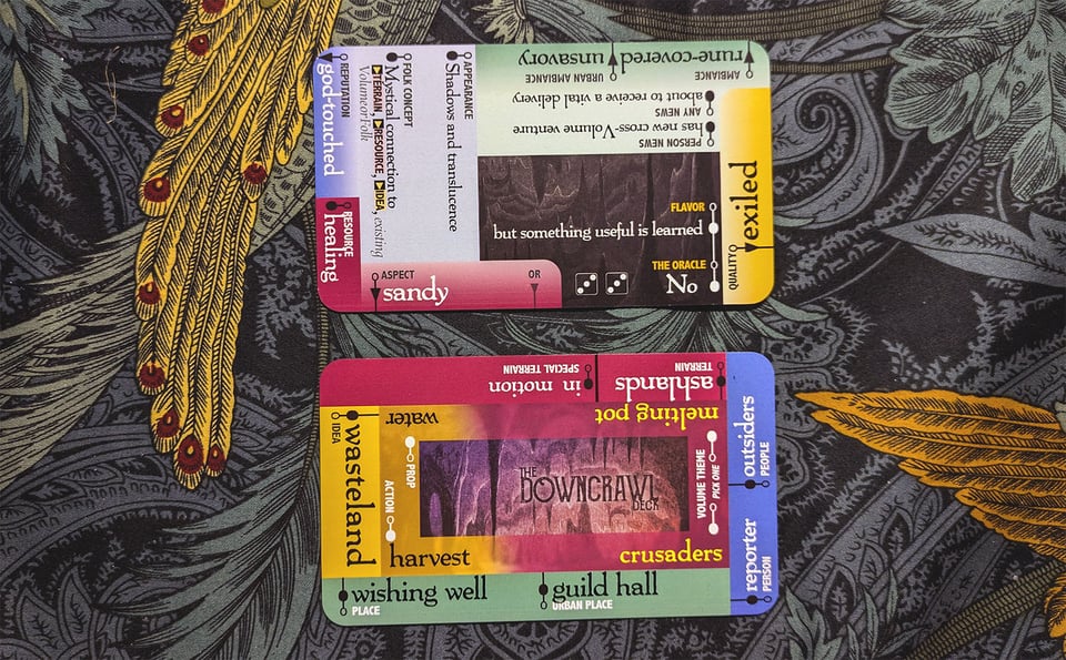 A front and back side of a Downcrawl Deck card, showing a series of color-coded prompts arranged around the edges.