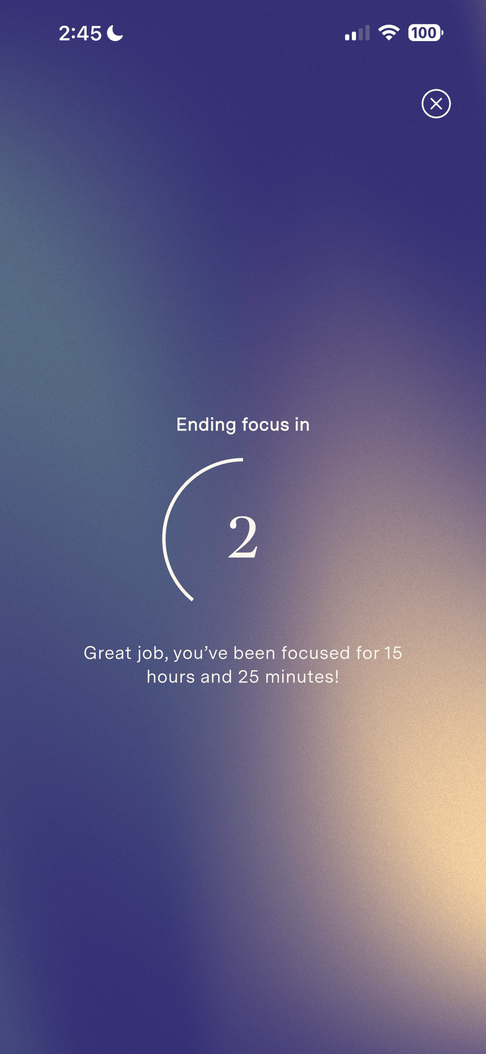 A calming purple and yellow gradient background with white text reading: "Great job, you've been focused for 15 hours and 25 minutes!"