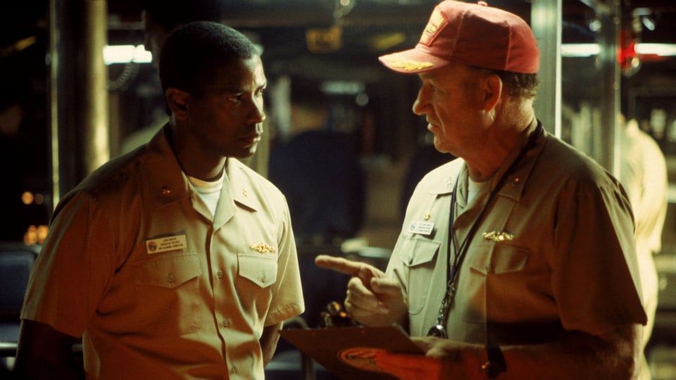 A confrontation between Denzel Washington and Gene Hackman in Crimson Tides.