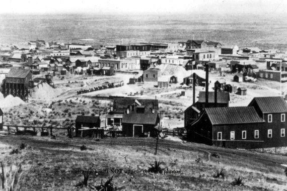 an old wild west town in the 19th century black and white photo